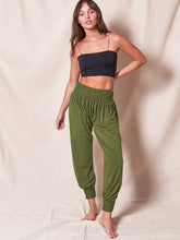 Pantalones largos sueltos de color liso con cintura elástica
